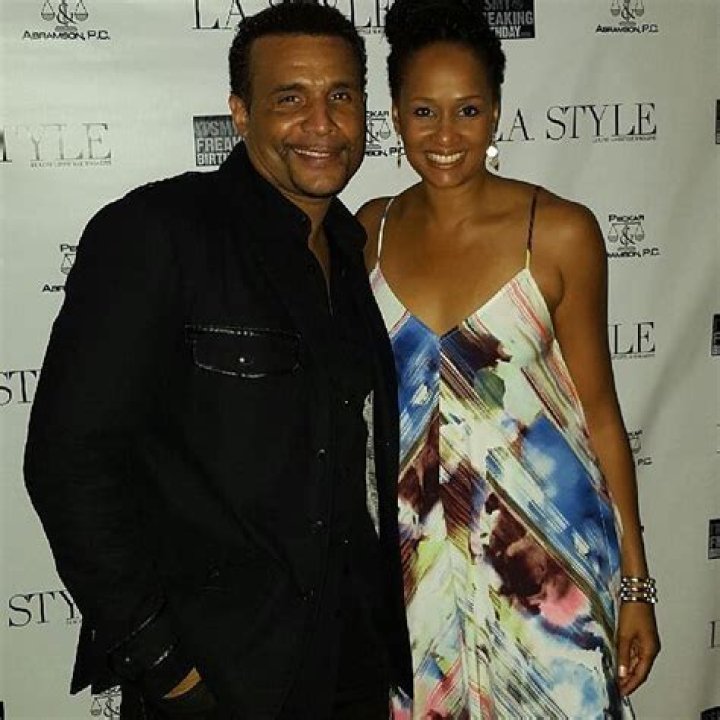 Who is David A. Arnold’s wife Julie Harkness?